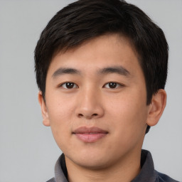 Neutral asian young-adult male with short  brown hair and brown eyes