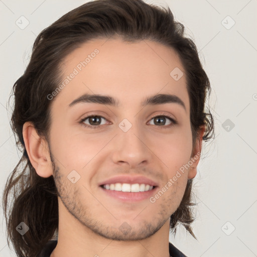 Joyful white young-adult male with medium  brown hair and brown eyes