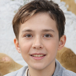 Joyful white child male with short  brown hair and brown eyes