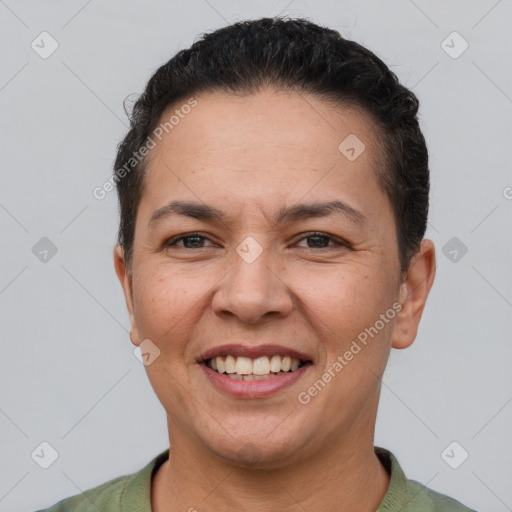 Joyful white adult female with short  brown hair and brown eyes