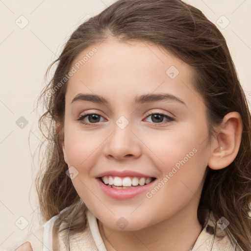 Joyful white child female with medium  brown hair and brown eyes