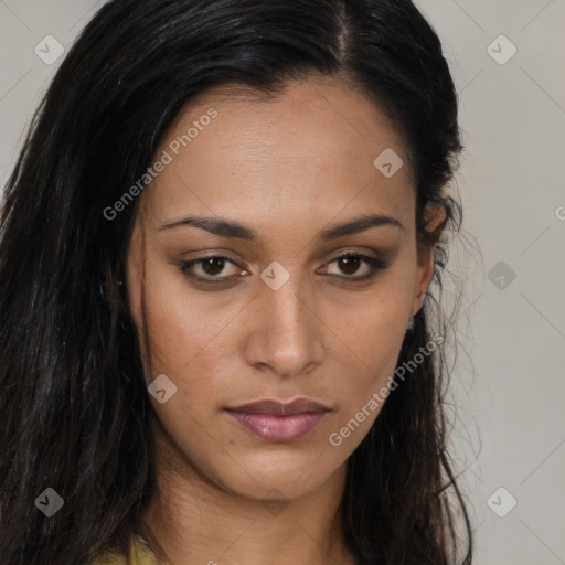 Joyful black young-adult female with long  brown hair and brown eyes