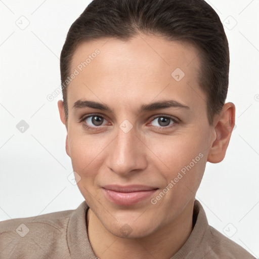 Joyful white young-adult female with short  brown hair and brown eyes