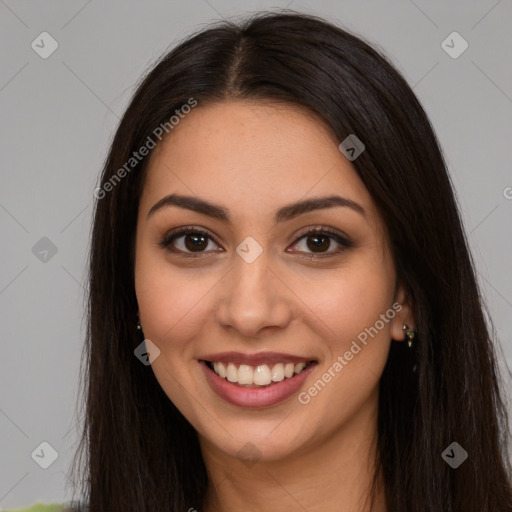 Joyful latino young-adult female with long  brown hair and brown eyes