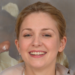 Joyful white young-adult female with medium  brown hair and grey eyes