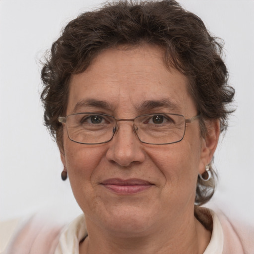 Joyful white middle-aged female with short  brown hair and brown eyes