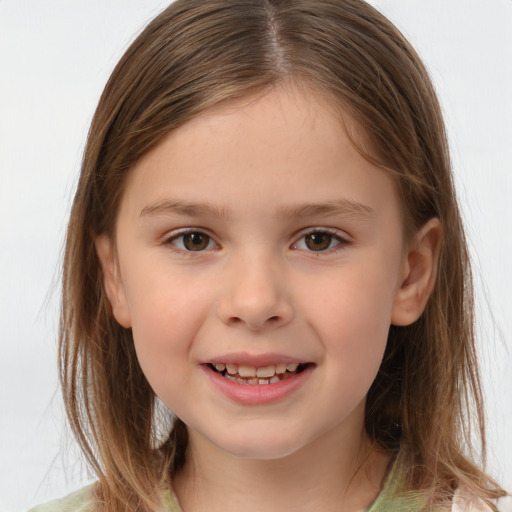 Joyful white child female with medium  brown hair and brown eyes