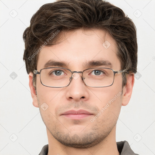 Neutral white young-adult male with short  brown hair and grey eyes