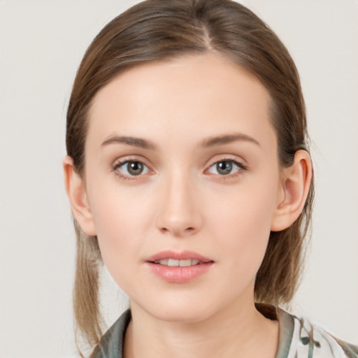 Neutral white young-adult female with medium  brown hair and brown eyes