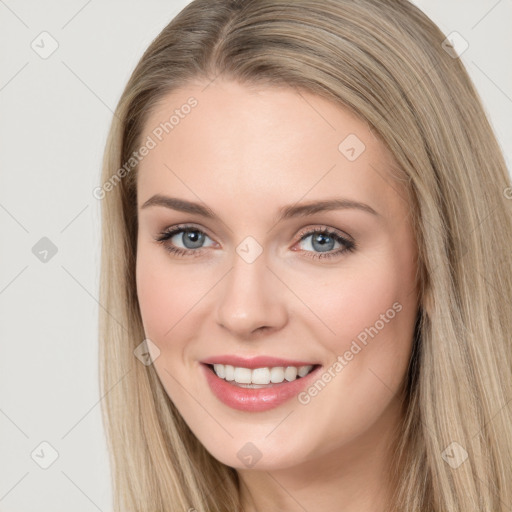 Joyful white young-adult female with long  brown hair and blue eyes