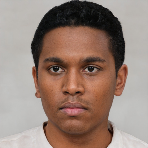 Neutral black young-adult male with short  black hair and brown eyes