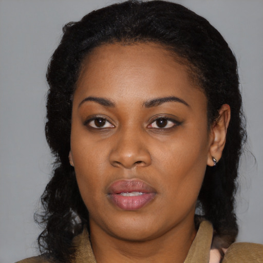Joyful black young-adult female with medium  black hair and brown eyes
