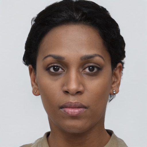 Neutral black young-adult female with short  black hair and brown eyes