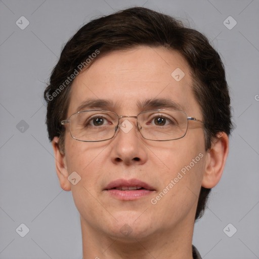 Joyful white adult male with short  brown hair and grey eyes