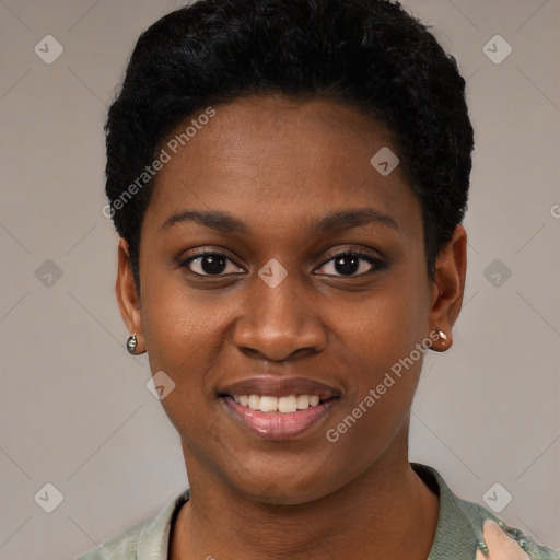 Joyful black young-adult female with short  black hair and brown eyes