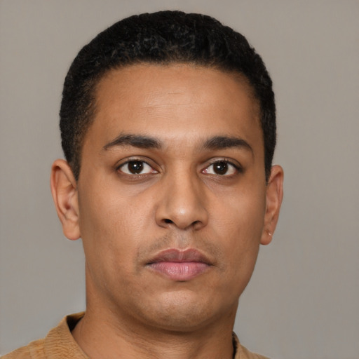Neutral latino young-adult male with short  brown hair and brown eyes