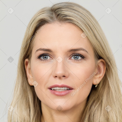 Joyful white young-adult female with long  brown hair and grey eyes