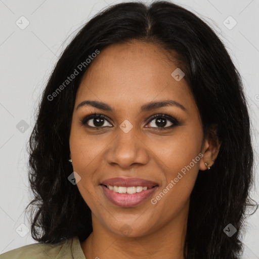 Joyful black young-adult female with long  brown hair and brown eyes