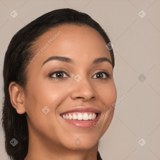 Joyful white young-adult female with long  brown hair and brown eyes