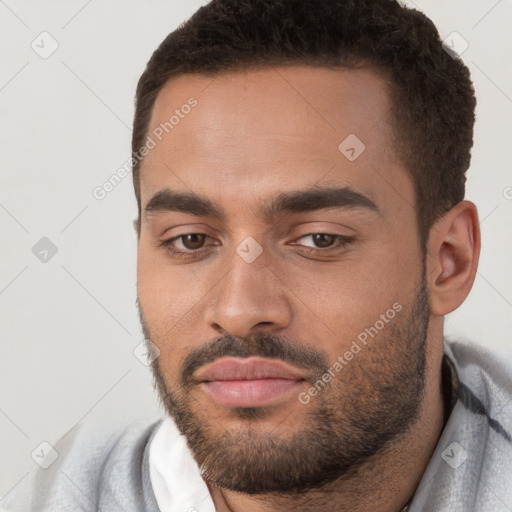 Neutral white young-adult male with short  brown hair and brown eyes