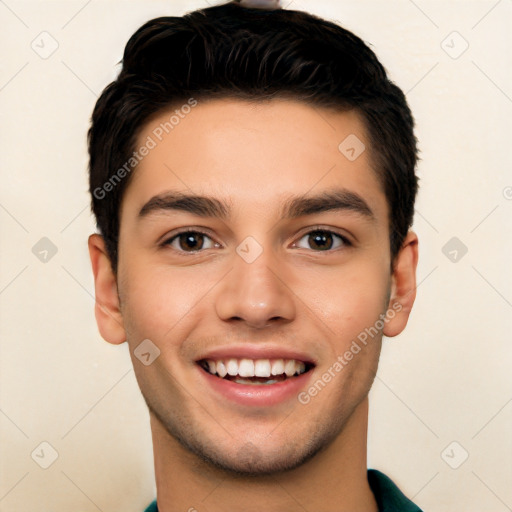 Joyful white young-adult male with short  black hair and brown eyes