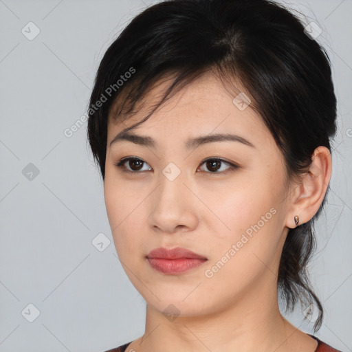 Neutral asian young-adult female with medium  black hair and brown eyes