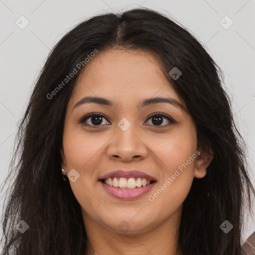 Joyful latino young-adult female with long  brown hair and brown eyes