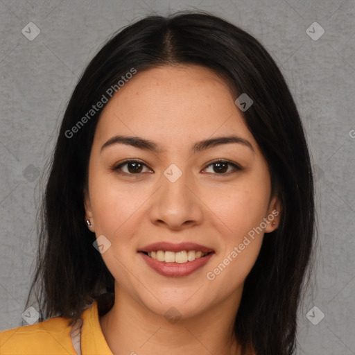 Joyful asian young-adult female with long  brown hair and brown eyes