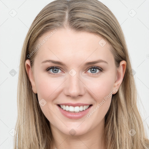 Joyful white young-adult female with long  brown hair and blue eyes