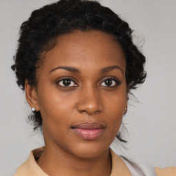 Neutral black young-adult female with short  brown hair and brown eyes