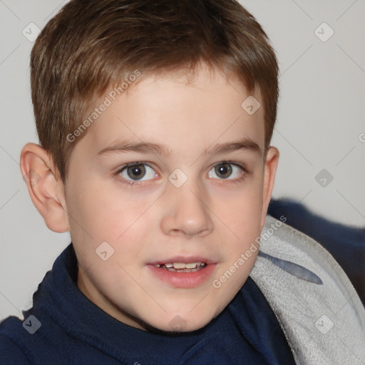 Joyful white child male with short  brown hair and brown eyes