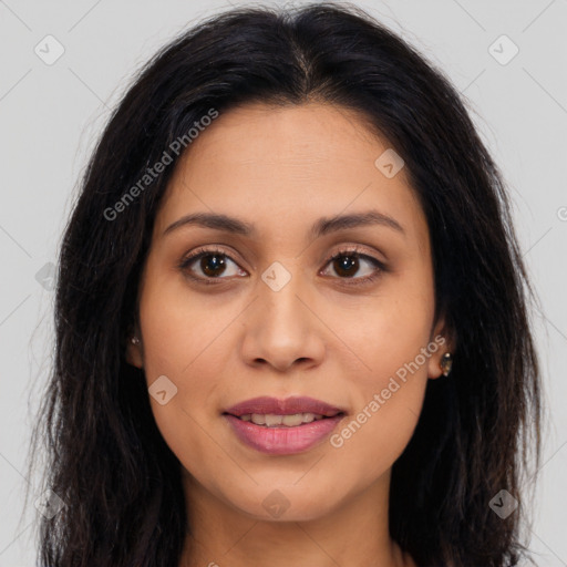 Joyful latino young-adult female with long  brown hair and brown eyes