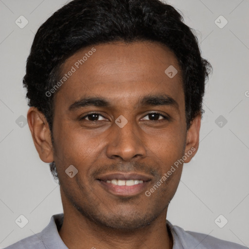 Joyful latino young-adult male with short  black hair and brown eyes