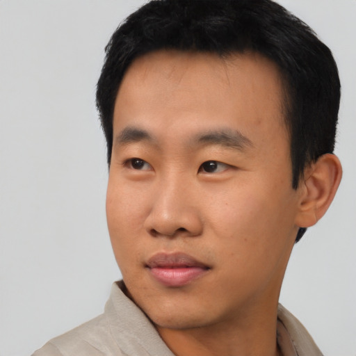 Neutral asian young-adult male with short  black hair and brown eyes