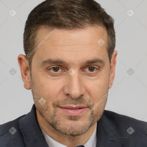 Joyful white adult male with short  brown hair and brown eyes