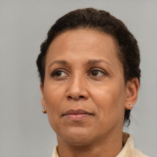 Neutral black adult female with short  brown hair and brown eyes