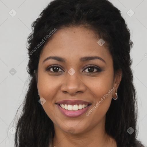 Joyful latino young-adult female with long  brown hair and brown eyes