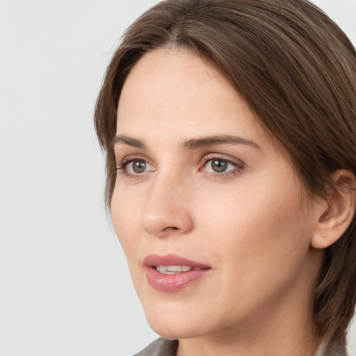 Neutral white young-adult female with medium  brown hair and brown eyes