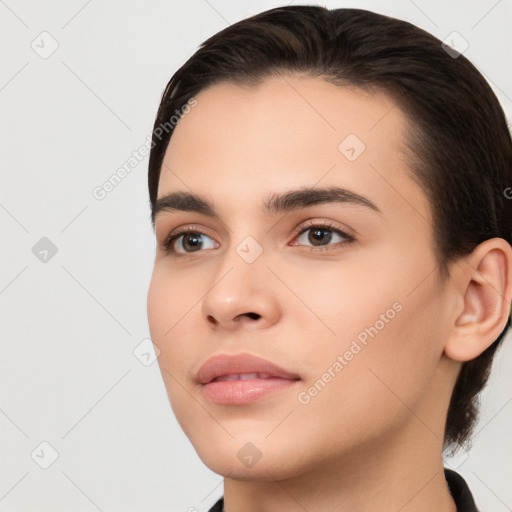 Neutral white young-adult female with medium  brown hair and brown eyes