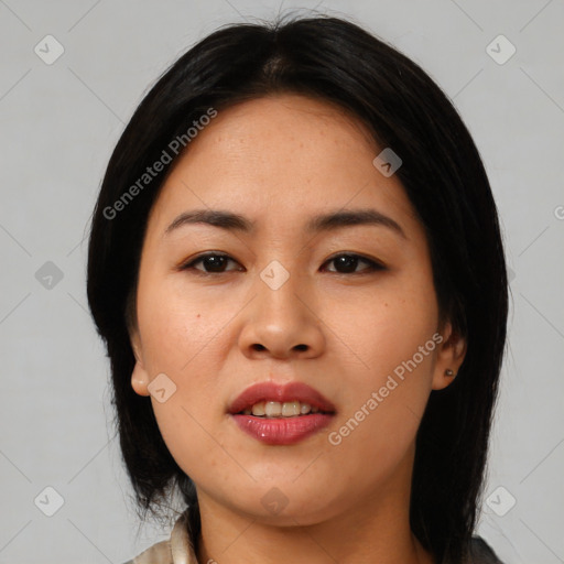 Joyful asian young-adult female with medium  black hair and brown eyes