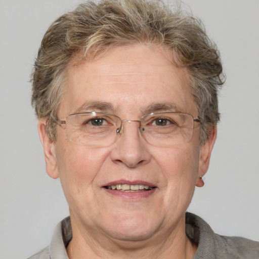 Joyful white middle-aged male with short  brown hair and brown eyes