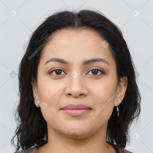 Joyful latino young-adult female with medium  brown hair and brown eyes