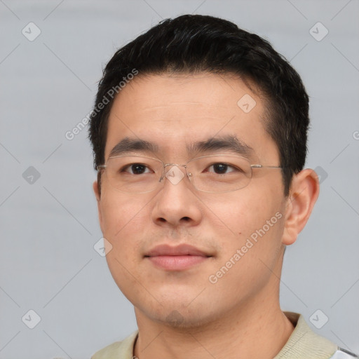 Neutral asian young-adult male with short  black hair and brown eyes