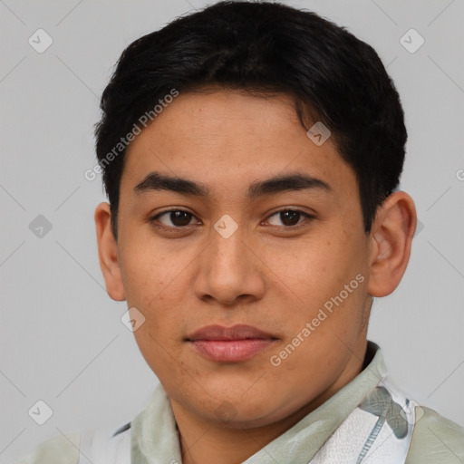 Joyful latino young-adult male with short  brown hair and brown eyes