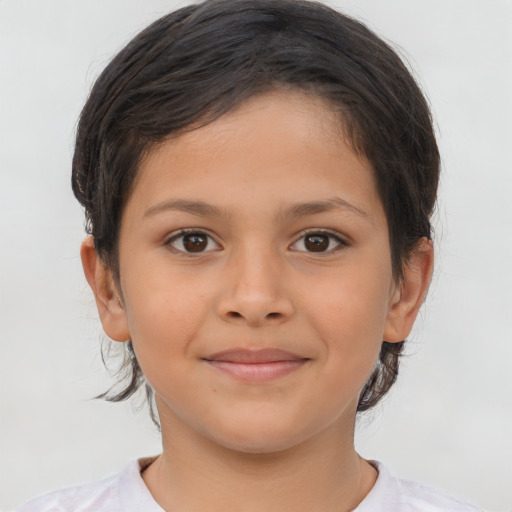 Joyful white child female with medium  brown hair and brown eyes
