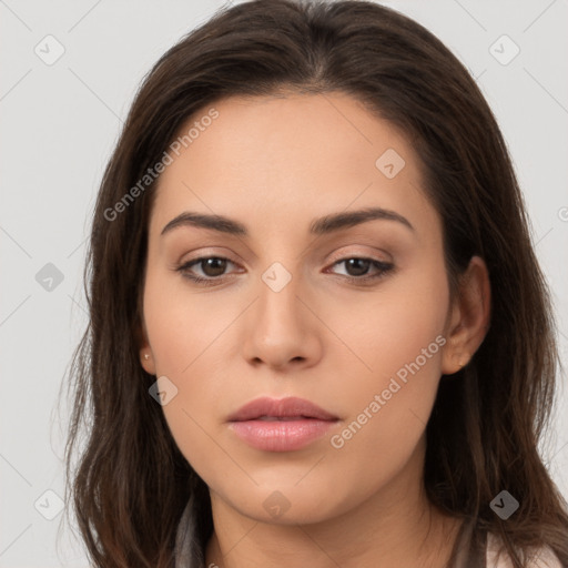 Neutral white young-adult female with long  brown hair and brown eyes