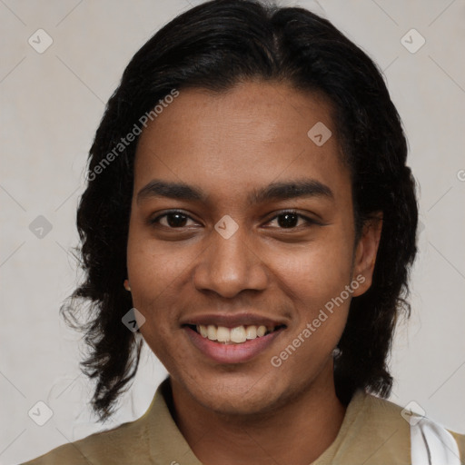 Joyful black young-adult female with medium  black hair and brown eyes