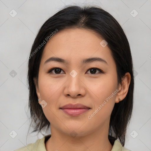 Joyful asian young-adult female with medium  brown hair and brown eyes