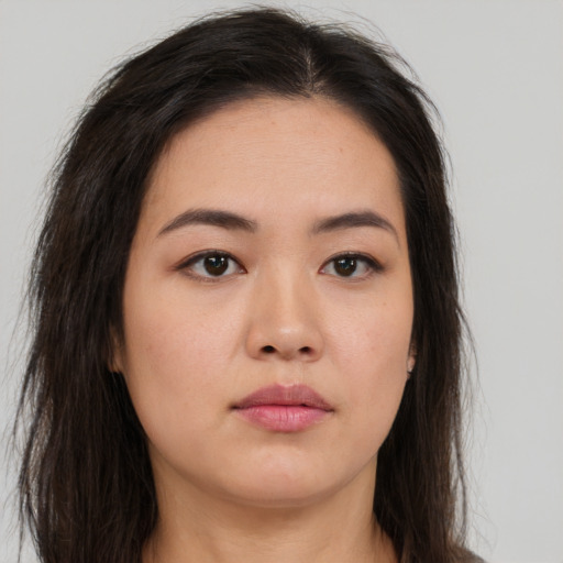 Neutral asian young-adult female with long  brown hair and brown eyes