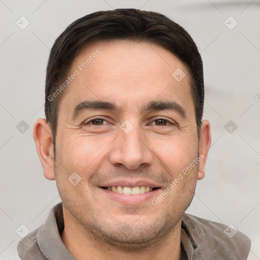 Joyful white young-adult male with short  brown hair and brown eyes